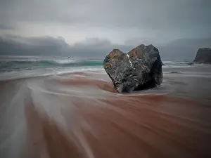 Asturias Prints: Long exposure of the flowing sea and a heart shaped rock on the Portizuelo beach
