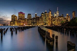 Wooden Post Gallery: Long exposure of the lights of Lower Manhattan during the evening blue hour as seen