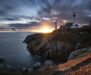 Finistere Prints: Long exposure panorama of a sunset with coloured clouds at Saint Mathieu Lighthouse