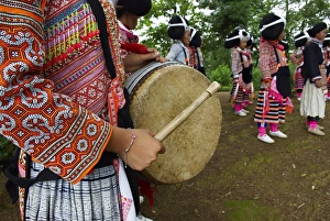 Images Dated 18th June 2007: Long Horn Miao girls in traditional costumes celebrating Flower Dance Festival, Longjia village