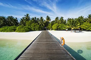 Long pier leading to a small island over turquoise water, Sun Island Resort, Nalaguraidhoo island