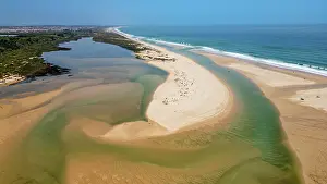 Swimming Prints: Long sandy beaches and river areas near Cacela Velha in Portugal offer sunshine and space for outdoor activities