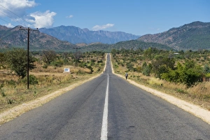 Malawi Prints: Long straight road in central Malawi, Africa
