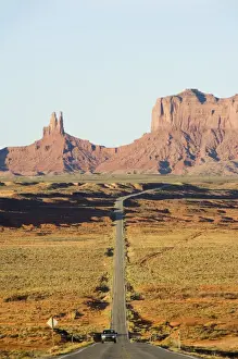 Journeying Prints: A long straight road leads into Monument Valley Navajo Tribal Park