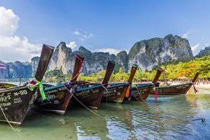 Rope Prints: Long tail boats and karst scenery on Railay beach in Railay, Ao Nang, Krabi Province