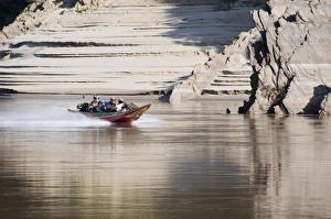 Images Dated 4th January 2008: Long tailed boats ferrying passengers down the Mekong River from Thailand to Luang Prabang