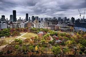 Nature Lovers Prints: Looking over the castle park onto the city skyline with dramatic sky in autumn