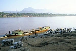 Unloading Prints: Looking east across the Mekong River in the evening