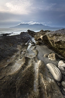 Images Dated 6th November 2008: Looking towards Isle of Rum at twilight from rocks at Singing Sands (Camas Sgiotaig)