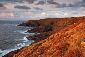 Looking towards Pendeen lighthouse and watch on the Cornish coastline, Cornwall, England, United Kingdom, Europe