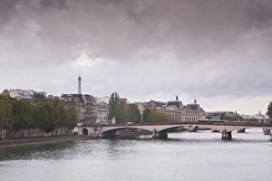 River Seine Prints: Looking down the River Seine in Paris on a rainy day, Paris, France, Europe