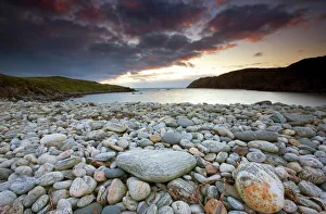 Images Dated 1st January 1970: Looking out to sea at sunset across the rocky beach at Gearranin, Isle of Lewis