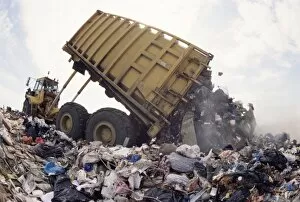 Lorry arrives at waste tipping area at landfill site, Mucking, London, England