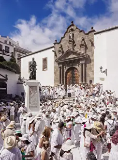 Females Prints: Los Indianos Carnival Party at Plaza de Espana in front of the El Salvador Church