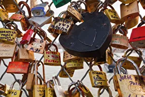 Fence Prints: Love locks on the Pont des Arts in Paris, France, Europe