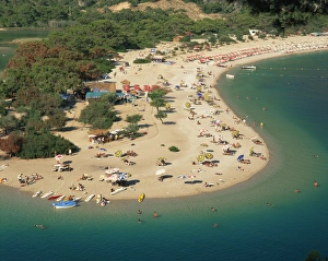 Low aerial of tourists on the Lagoon Beach