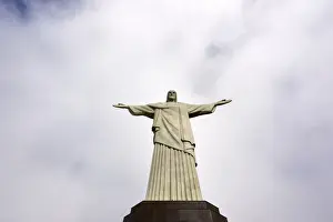 Brazilian Prints: Low angle shot of Christ the Redeemer statue in Rio de Janeiro in a cloudy day