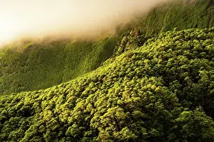 Azores Prints: Low clouds drift over green highlands on Flores Island in Azores