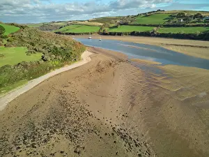 Seashore Prints: A low tide aerial drone view of the sandy shore and sand banks in the estuary of the River Avon