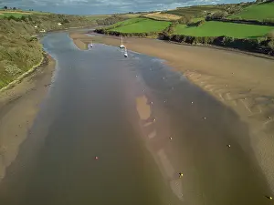 Ripples Prints: A low tide aerial drone view of the sandy shore and sand banks in the estuary of the River Avon