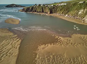 Dunes Prints: A low tide aerial drone view of the sandy shore and sand banks in the estuary of the River Avon