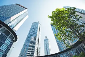 Hangzhou Prints: Low wide angle view of a group of new skyscrapers combined with fresh greenery in Jianggan