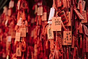 Red Colour Prints: Lucky charm tokens, Confucian Temple, Jianshui, Yunnan Province, China, Asia