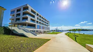 Terrace Prints: Luxury resort overlooks water on a sunny day in Pula, Istria, Croatia