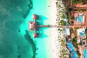 Swimming Pool Prints: Luxury resort on white coral beach in the clear turquoise water
