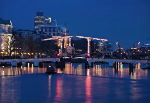 The Magere Bridge at night, also known as the Skinny Bridge, Amstel River