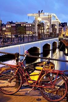 Amsterdam Prints: Magere Brug (Skinny Bridge) at dusk, Amsterdam, Holland, Europe