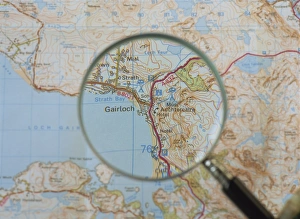 Navigation Prints: Magnifying glass above an Ordnance Survey map
