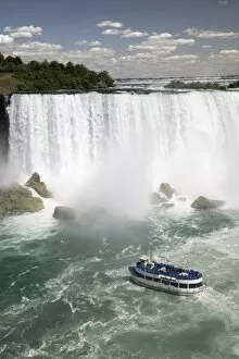 Maid of the Mist sails near the American Falls in Niagara Falls, New York State
