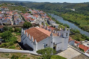 Alentejo Prints: Main Church of Mertola overlooks the Guadiana River in Alentejo region Portugal