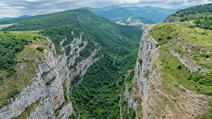National Prints: Majestic canyon view from above in Qarabaqh with surrounding hills and valleys under cloudy skies