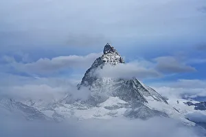 Matterhorn Prints: Majestic Matterhorn in autumn mist during the blue hour