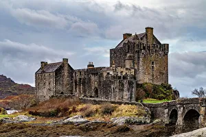 Strong Prints: Majestic medieval castle with stone bridge over a river