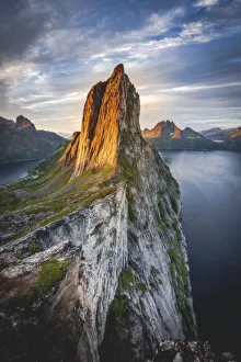 Majestic Mount Segla and fjords under a cloudy sky at sunrise, Senja island, Troms county