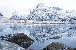 Nordland Gallery: Majestic mountain peaks mirrored in the icy sea in winter, Flakstadpollen, Flakstadoya, Nordland