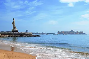 Shishi Prints: Majestic statue of Guanyin (Goddess of Mercy) with Luojia Temple in the sea in the background
