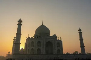 Spires Prints: Majestic Taj Mahal displayed against the backdrop of a sunrise in Agra