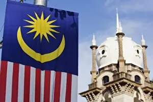 Images Dated 5th September 2009: Malaysian flag and Old KL Railway Station, Kuala Lumpur, Malaysia, Southeast Asia, Asia