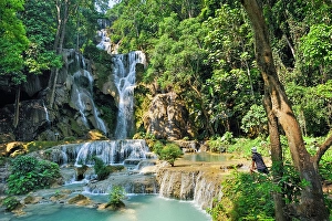 Relax Prints: Man admiring the Kuang Si waterfalls, Luang Prabang, Laos
