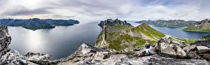 Camera Prints: Man with camera photographing Hesten and Inste Kongen mountains standing on Segla peak