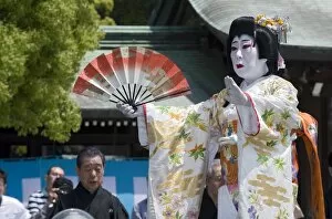 Images Dated 2nd May 2009: Man dressed as a woman performing classical Japanese dance called hobu at Meiji Jingu shrine