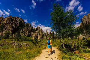 Man hiking the trails and enjoying the sights in the Black Hills of Keystone