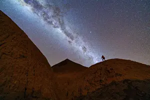 Dust Prints: Man looking at the Milky Way, Devil's Desert, Puna, Salta, Argentina