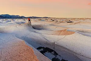 Wanderlust Prints: Man looking at volcanic landscape