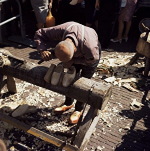 Netherland Prints: Man making clogs