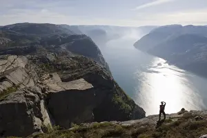 One Man Only Prints: Man photographing the fjord, Preikestolen (Pulpit Rock), Lysefjord, Norway